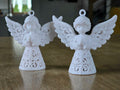 Dúo de ángeles navideños 3D impresos en blanco con detalle calado