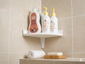 Esquinero de ducha 3D blanco con productos de higiene en baño moderno
