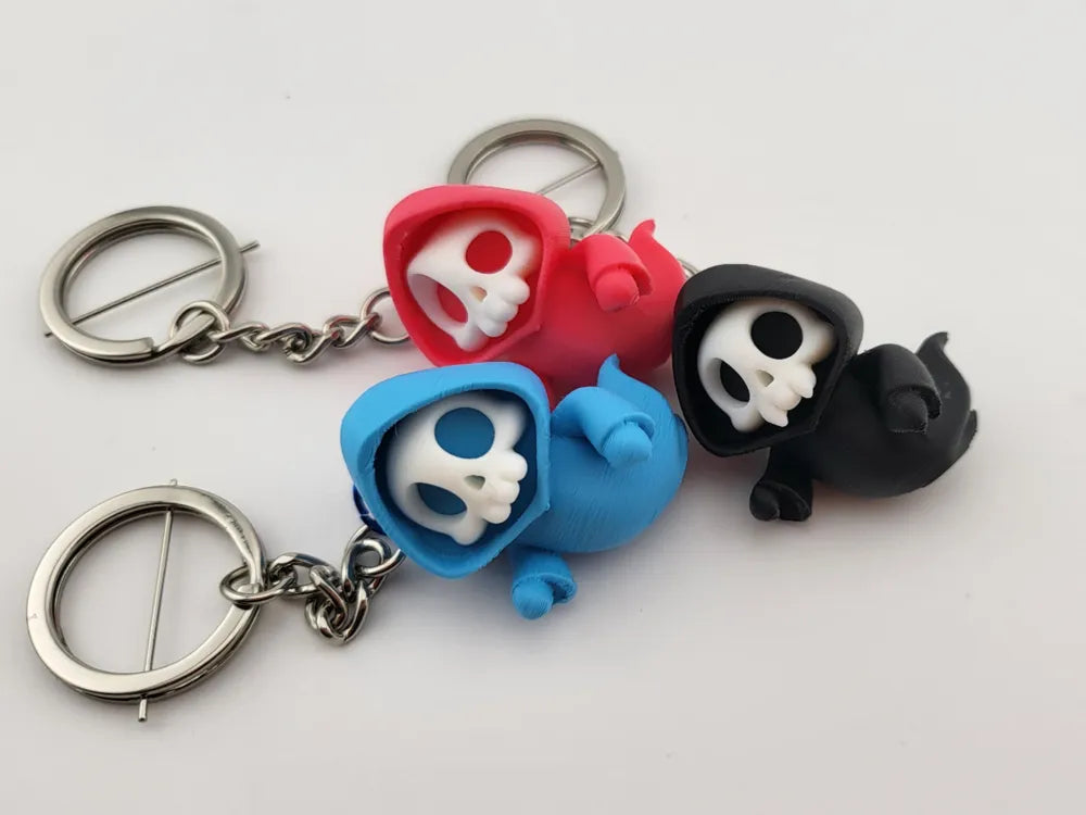 Llavero muerte con capucha 3D chibi - 5cm color a elección rojo azul negro